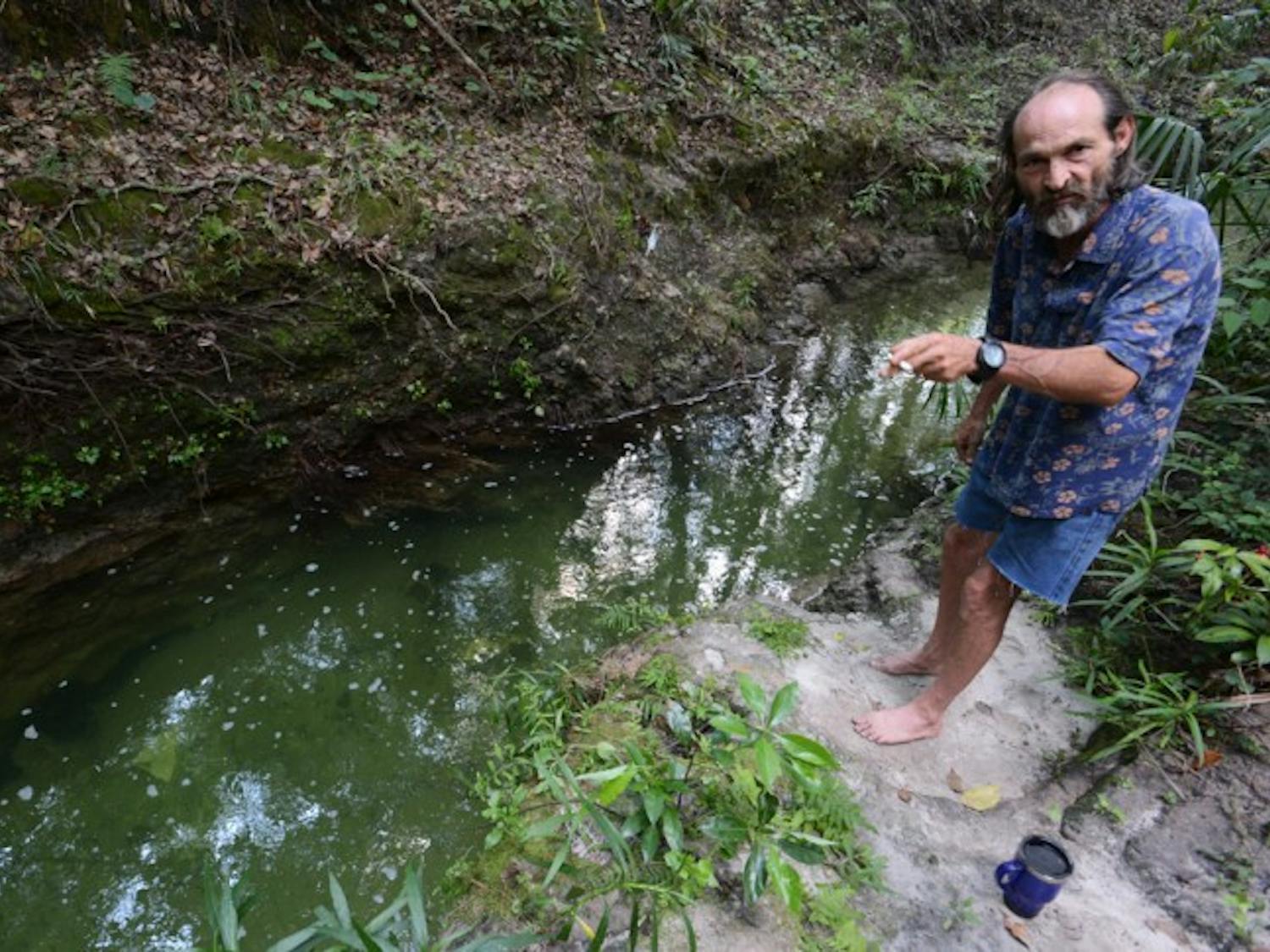 J.C. Goodwin, on Wednesday afternoon at the scene of the attack, explains how his friend, James Wimmer, was attacked by an alligator two days earlier.