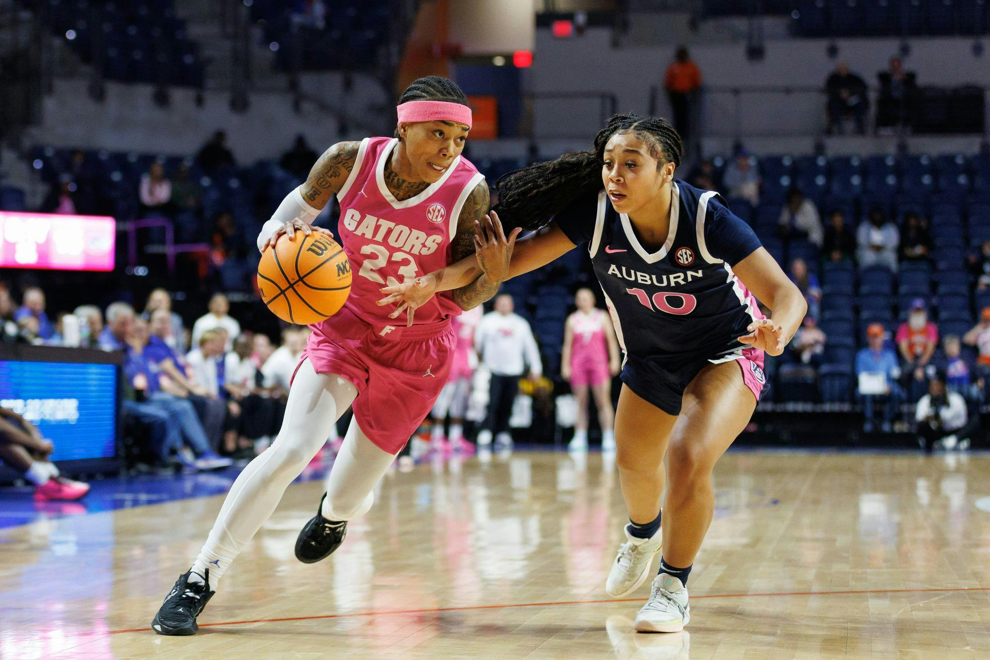 Florida guard Liv McGill (23) dribbles the ball during the first half of an NCAA basketball game against Auburn, Thursday, Feb. 5, 2026, in Gainesville, Fla.