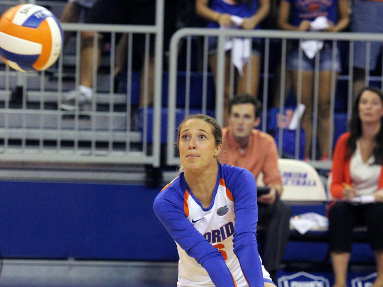 Mackenzie Dagostino squats during Florida’s three-set victory against Florida State on Tuesday in the O’Connell Center.