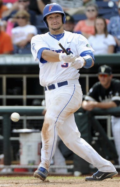 Florida catcher Mike Zunino had his aluminum bat sawed off in the eighth inning of UF's 6-4 win over Vanderbilt on Friday at the College World Series