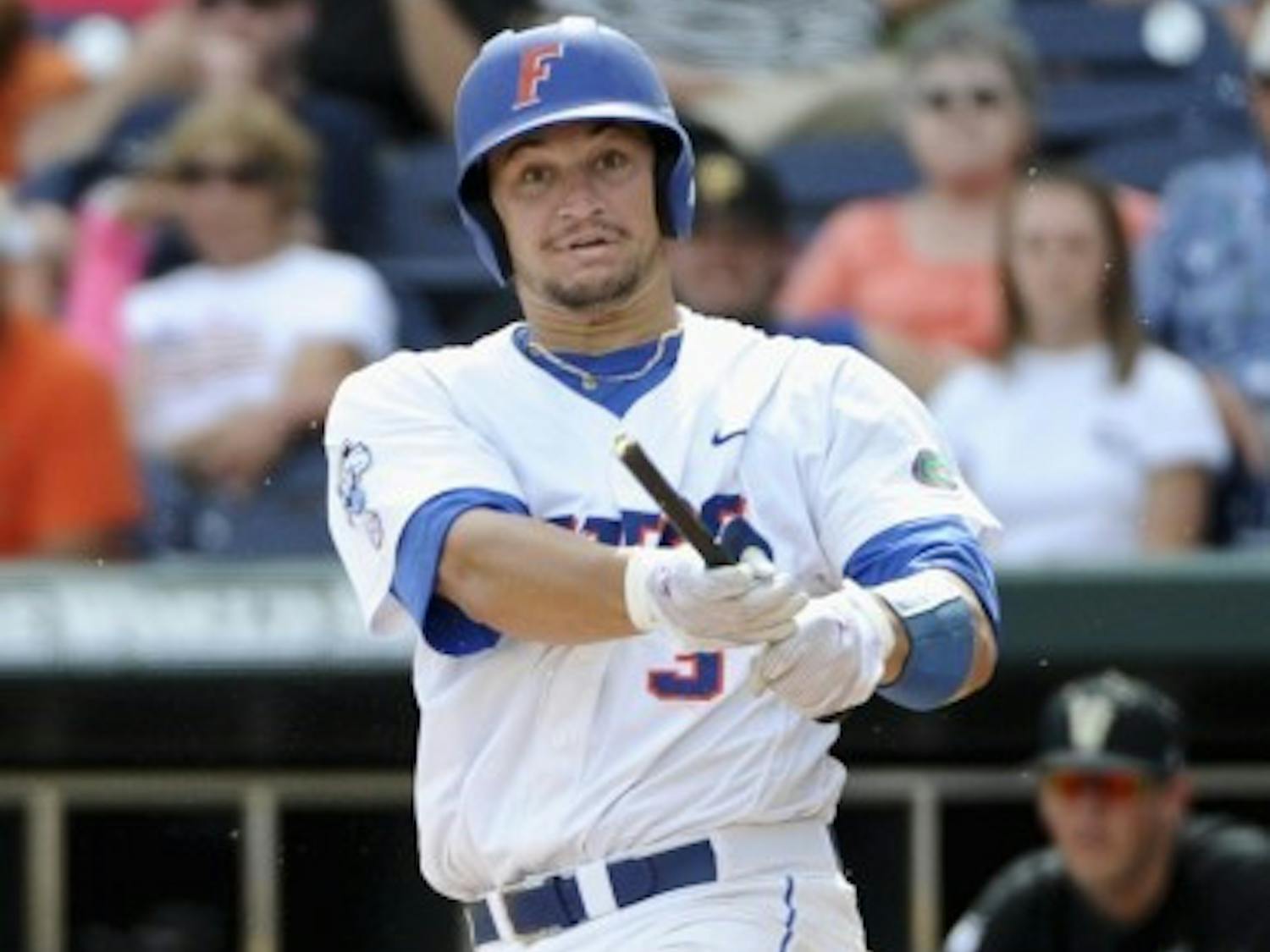 Florida catcher Mike Zunino had his aluminum bat sawed off in the eighth inning of UF's 6-4 win over Vanderbilt on Friday at the College World Series