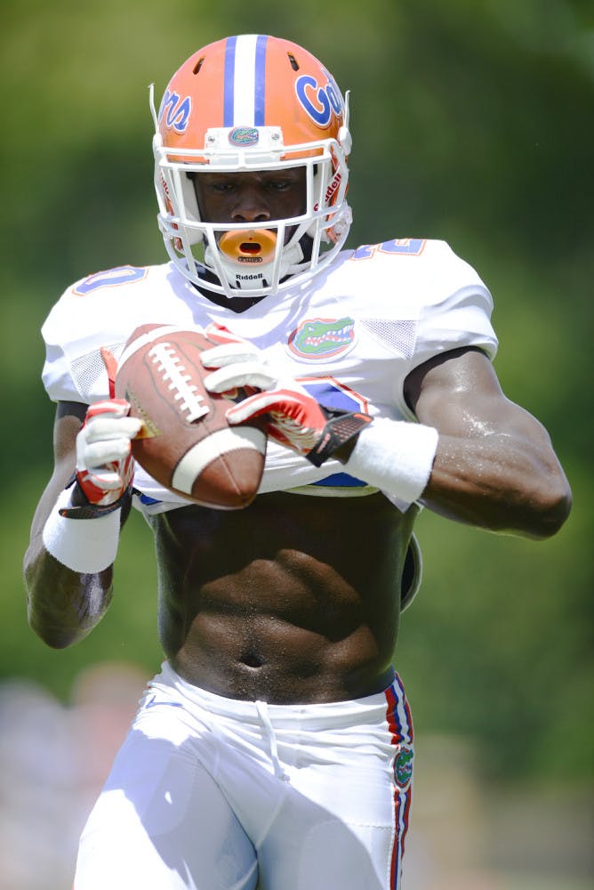 Redshirt freshman safety Marcus Maye catches passes in a drill during practice on Monday. Maye and junior Cody Riggs are the projected starters at safety after three weeks of practice.