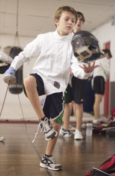 Ariel Levites, a 13-year-old, fences at Unified Training Center for Fencers Club Gainesville on Tuesday. Members are training for a competition.