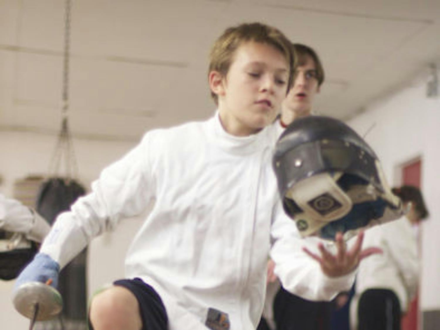 Ariel Levites, a 13-year-old, fences at Unified Training Center for Fencers Club Gainesville on Tuesday. Members are training for a competition.
