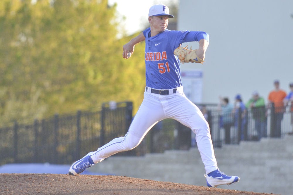 Brady Singer pitches UF's 8-4 win over Florida Gulf Coast on Feb. 20, 2016, at McKethan Stadium.