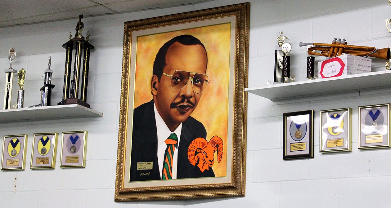 A portrait of former band director Richard E. Parker hangs inside the band room at Eastside High School on Friday, Feb. 12, 2021. Parker was the Eastside marching band director from 1970 to 1990.