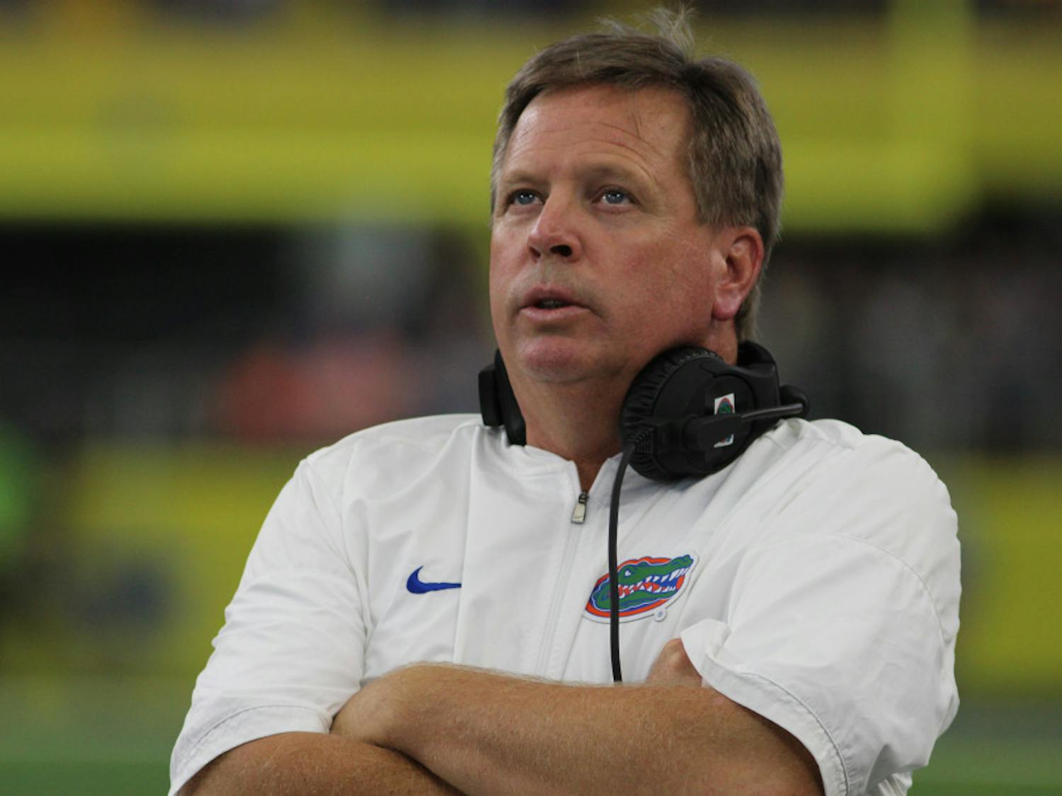 UF coach Jim McElwain watches on during Florida's 33-17 loss against Michigan at AT&T Stadium in Arlington, Texas.