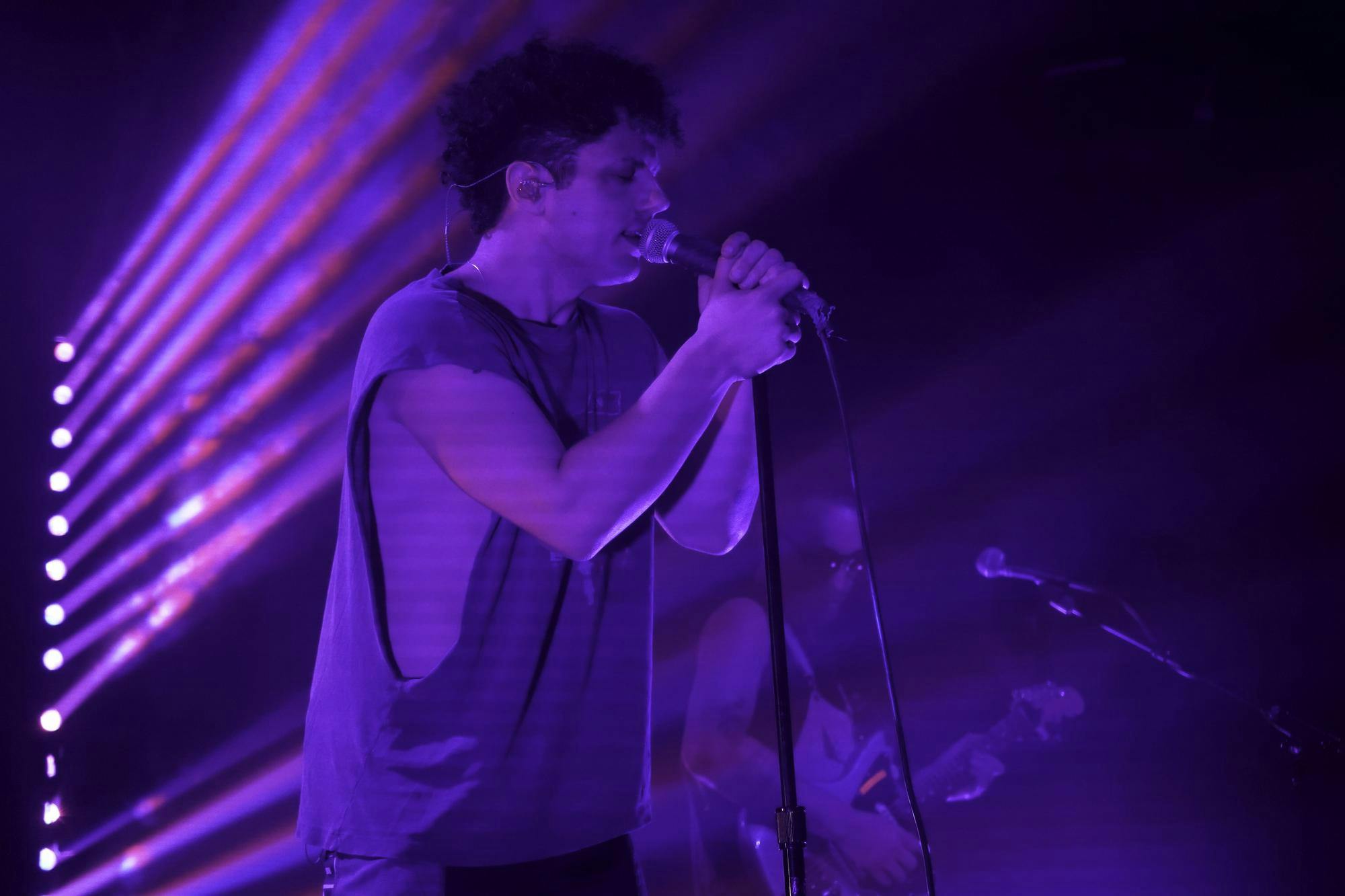 Lead singer of the band Nightly, Jonathan Capeci, sings 'Gas Station Cowboy Hats' from their latest album 'Songs to Drive to' at The Wooly on North Main St., on Sunday, April 6, 2025.