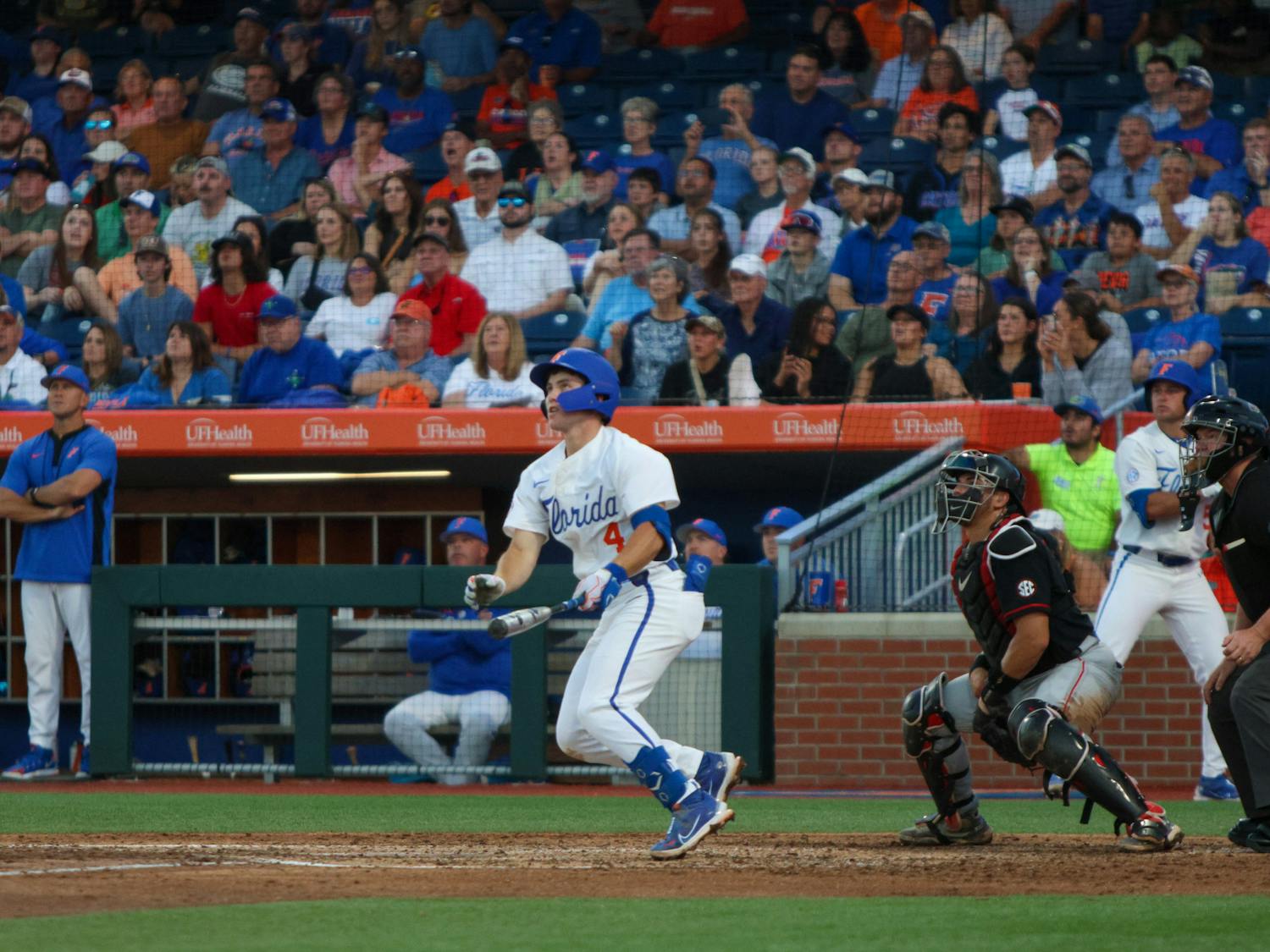 Florida second baseman Cade Kurland watches his hit during the Gators' 13-11 loss to the Georgia Bulldogs Friday, April 14, 2023