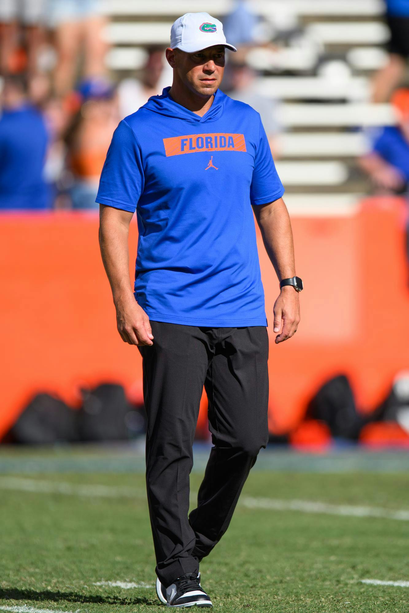 Florida head coach Jon Sumrall walks the field during warmups before an NCAA college football game against Campbell, Saturday, Sept. 12, 2026, in Gainesville, Fla.