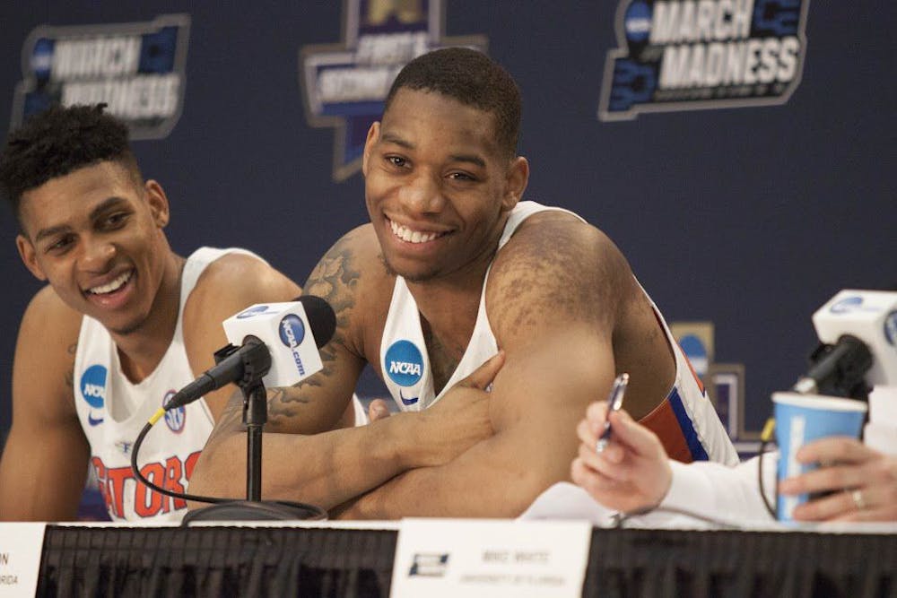 <p>Florida forwards Justin Leon and Devin Robinson (left) smile during a press conference following the Gators' 65-39 win against Virginia in the NCAA Tournament on Saturday in Orlando, Florida.</p>