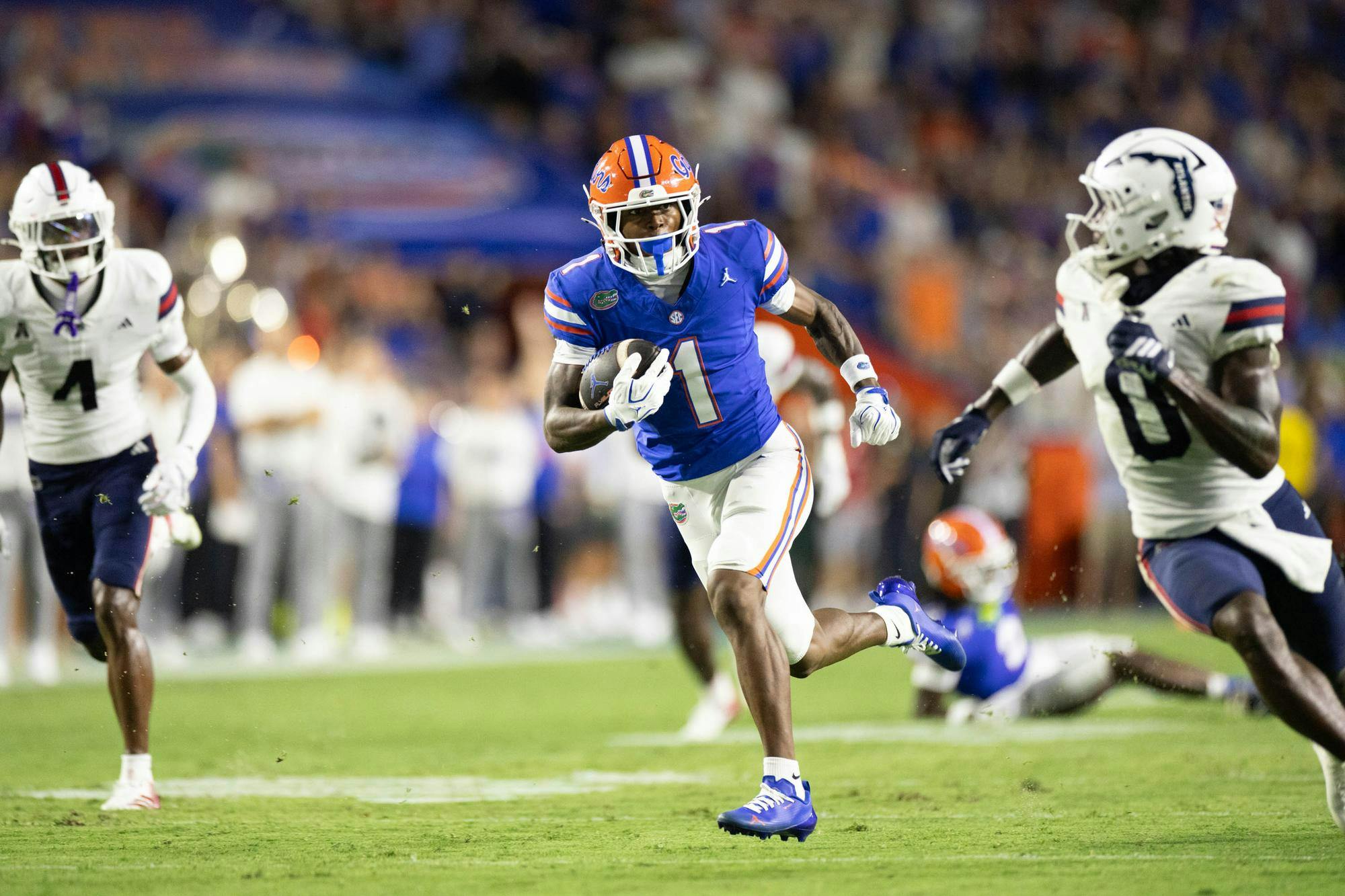 Florida wide receiver Vernell Brown III (1) runs with the ball during the first half of an NCAA college football game against FAU, Saturday, Sept. 5, 2026, in Gainesville, Fla.