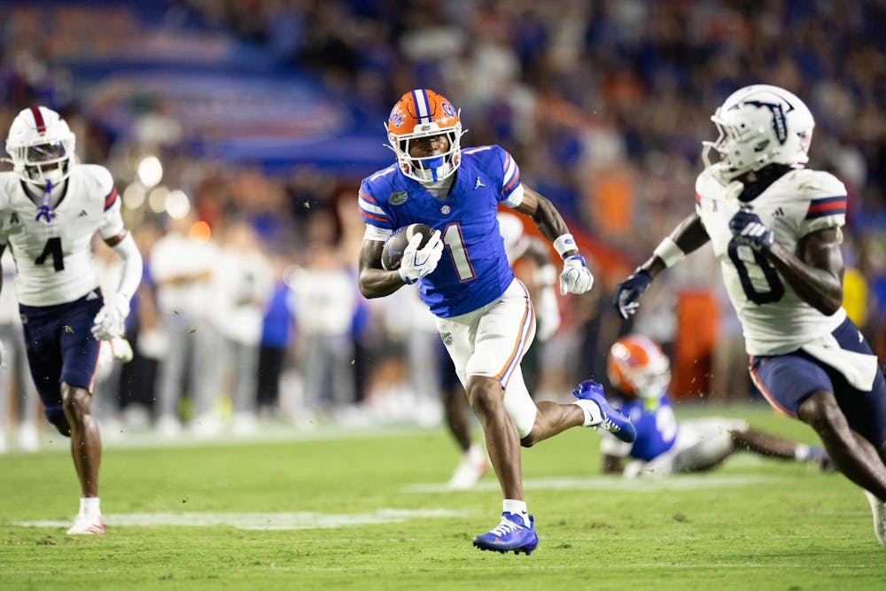 Florida wide receiver Vernell Brown III (1) runs with the ball during the first half of an NCAA college football game against FAU, Saturday, Sept. 5, 2026, in Gainesville, Fla.