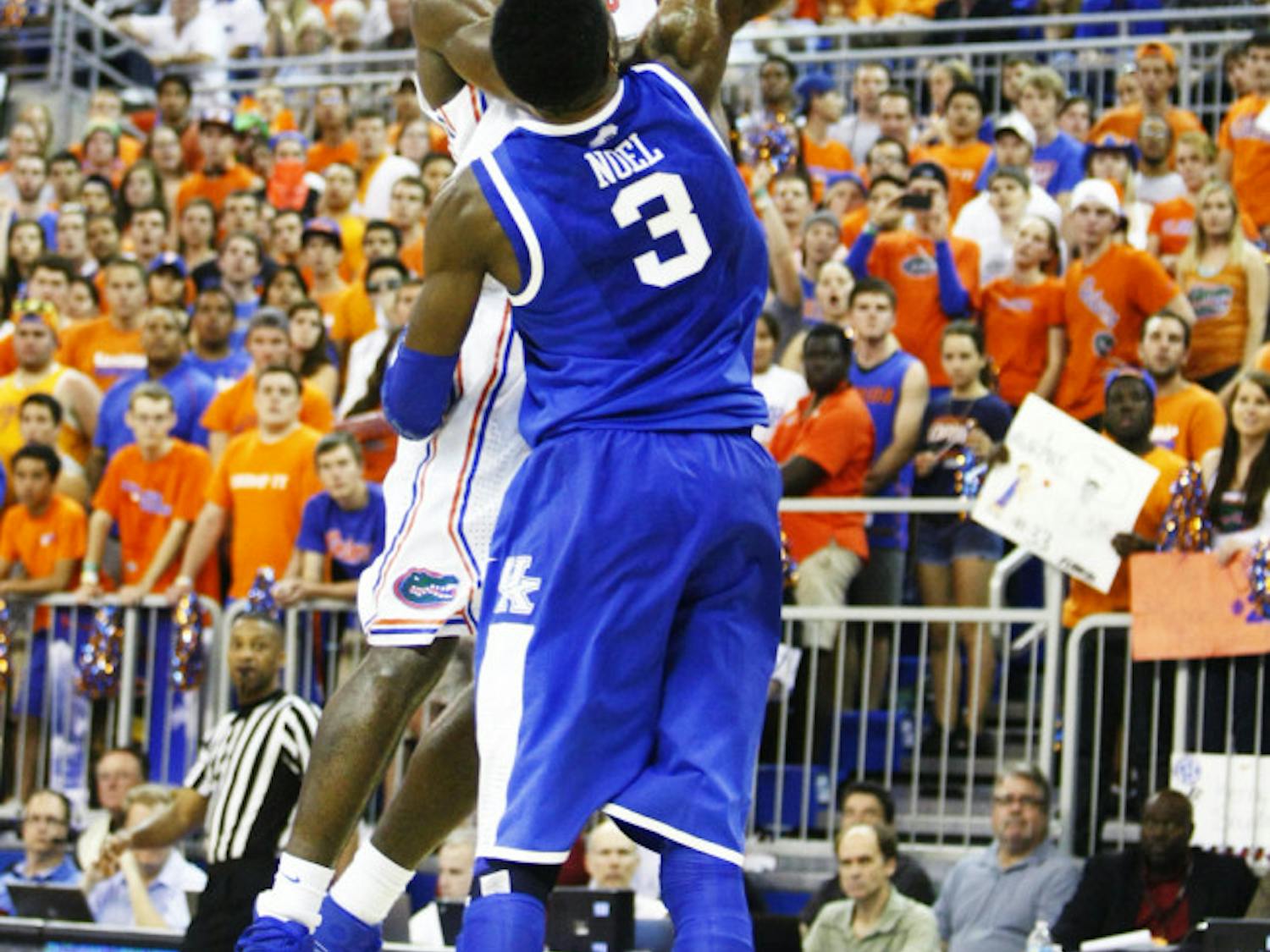 UF center Patric Young attempts a layup against UK center Nerlens Noel during the Gators’ 69-52 win against the Wildcats on Tuesday in the O’Connell Center.