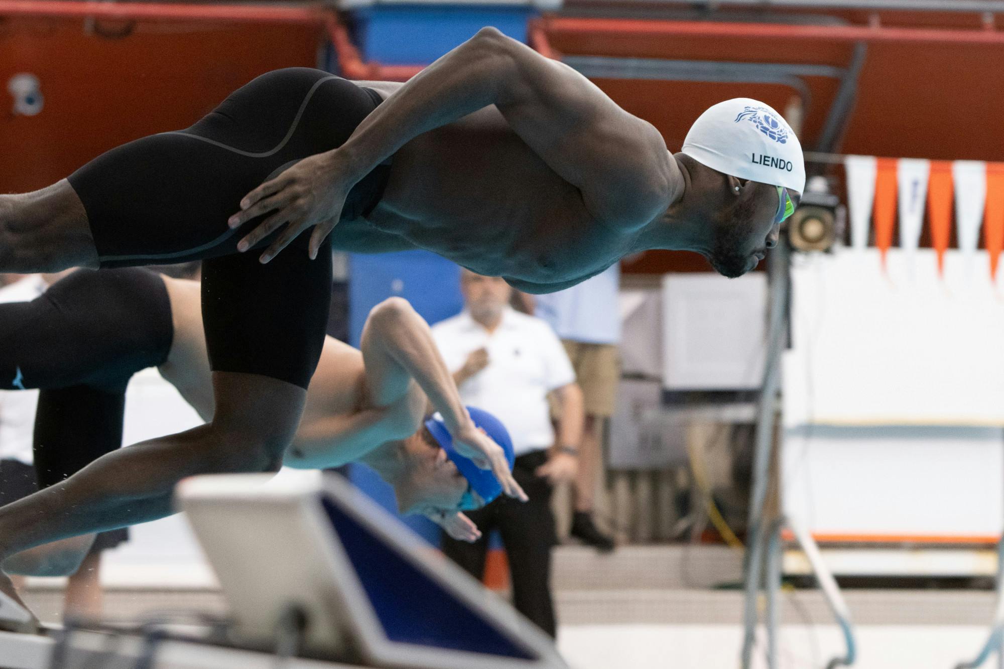 Sophomore Joshua Liendo dives into the water for a competition swim in the Florida Invitational against Nova Southeastern, Friday Feb. 2, 2024. 
