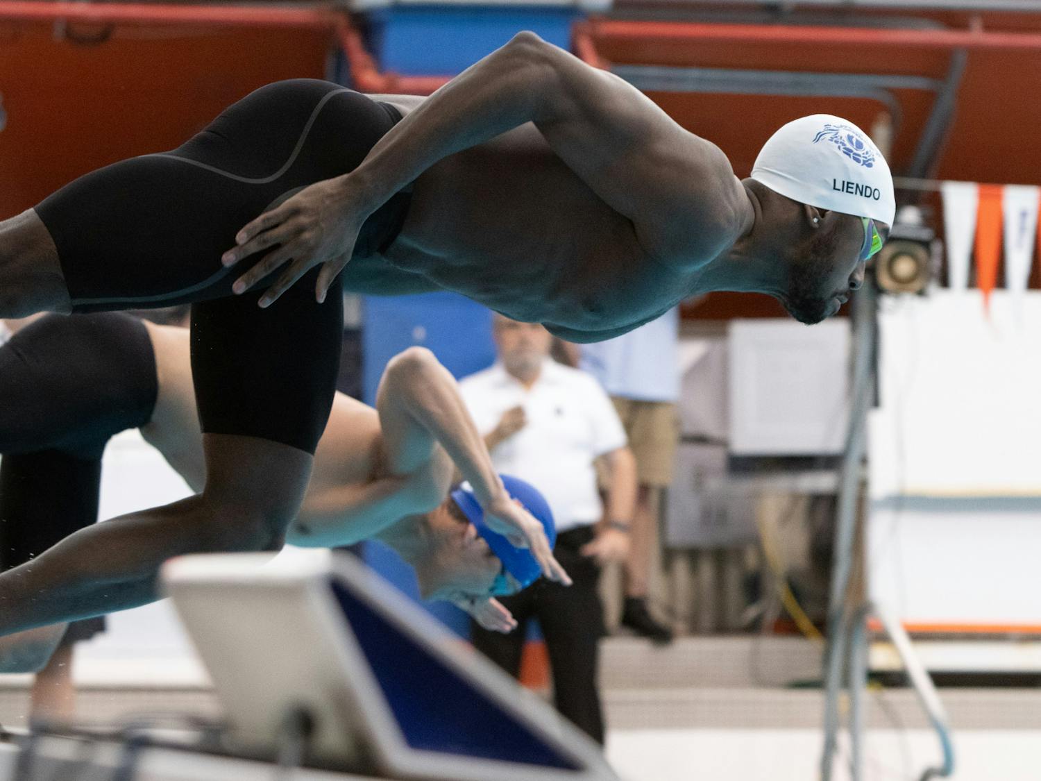 Sophomore Joshua Liendo dives into the water for a competition swim in the Florida Invitational against Nova Southeastern, Friday Feb. 2, 2024. 