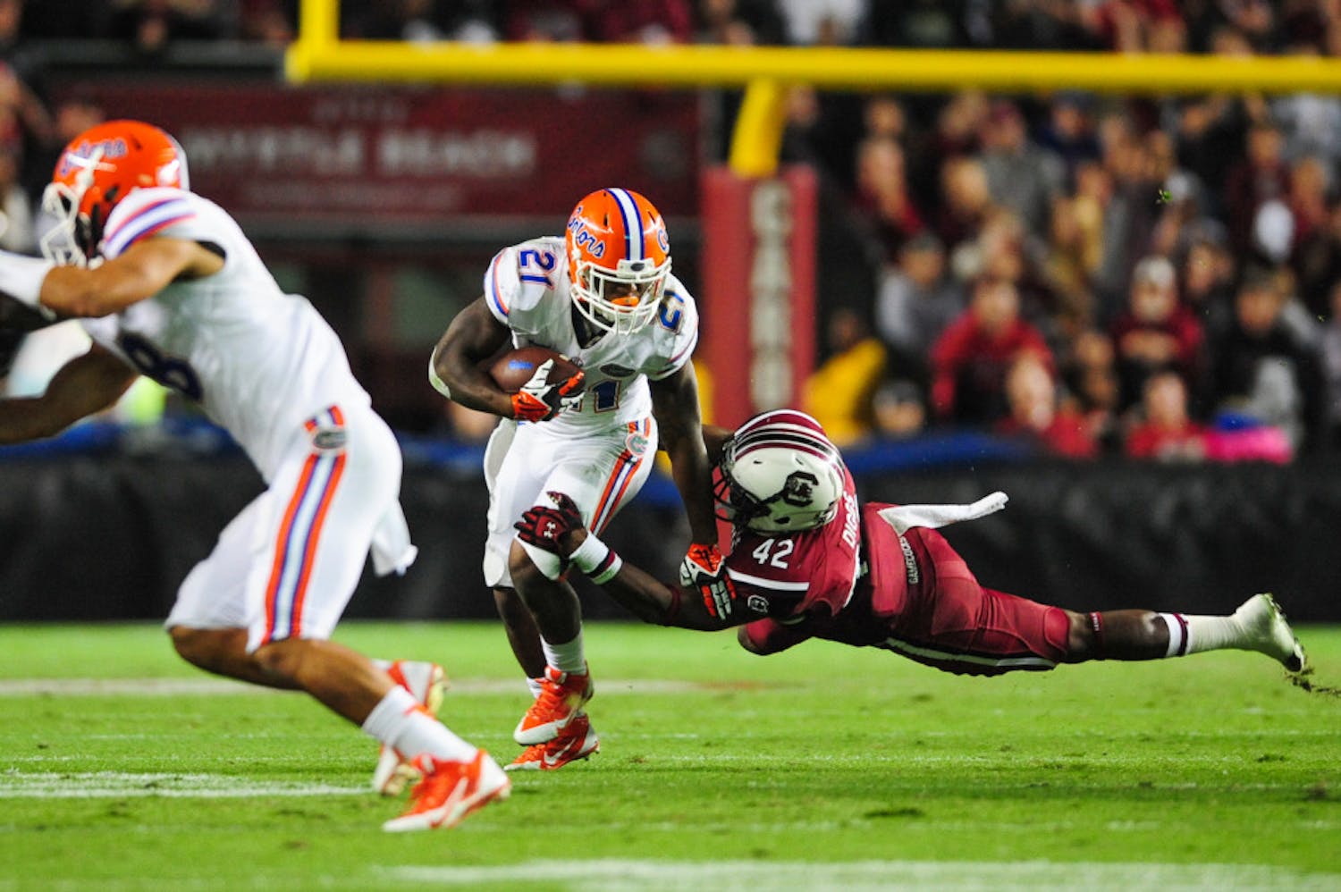 Freshman running back Kelvin Taylor tries to escape a tackle during Florida's 19-14 loss to No. 10 South Carolina on Saturday night at Williams-Brice Stadium in Columbia, S.C.