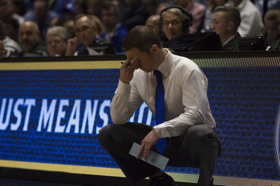 UF head coach Mike White expresses frustration during Florida's 72-62 loss to Vanderbilt in the Southeastern Conference Tournament on March 10, 2017, in Nashville, Tennessee.