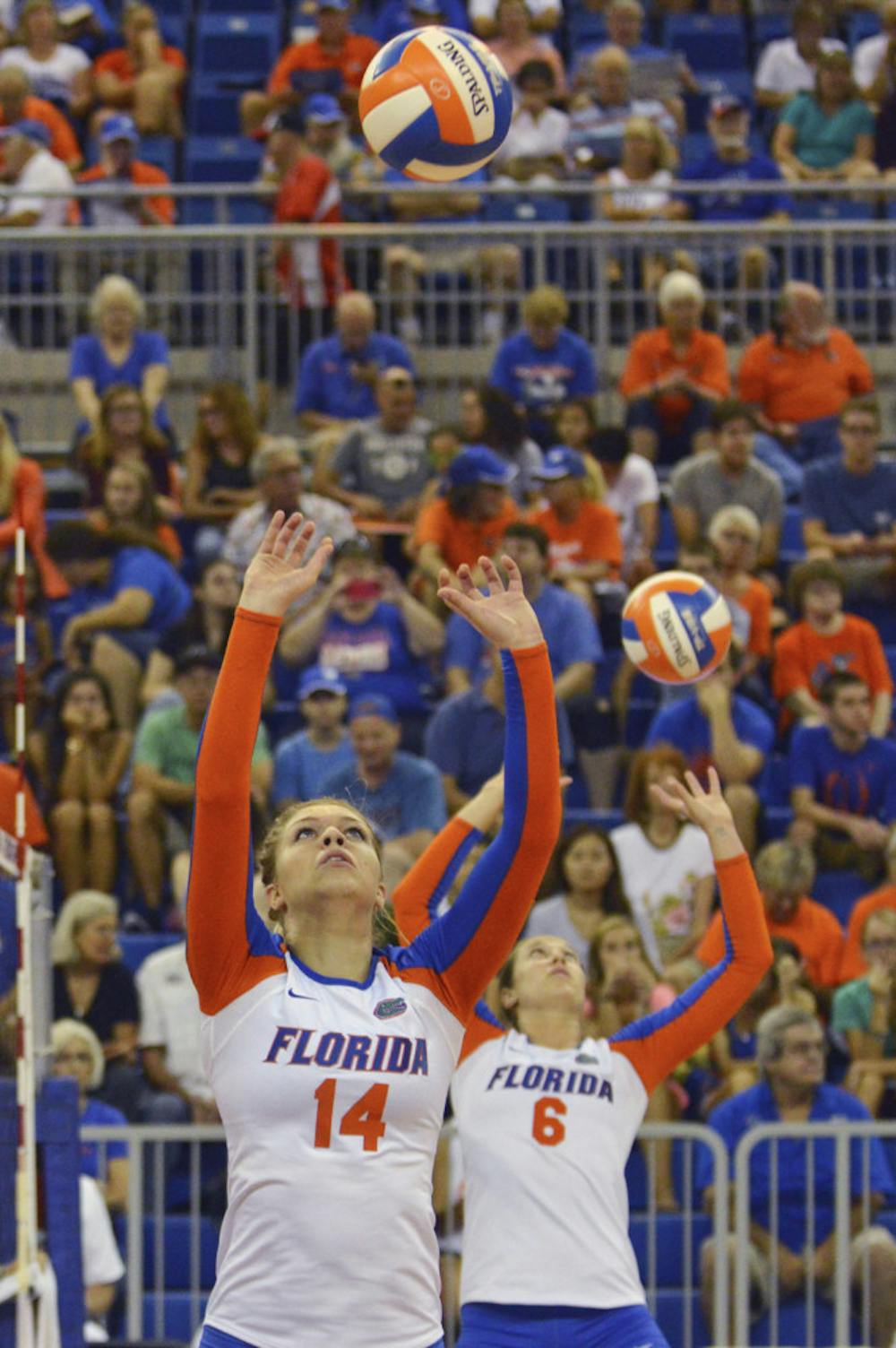 <p>Abby Detering (14) sets the ball during warmups before Florida's 3-0 win against Georgia on Oct. 10, 2014, in the O'Connell Center.</p>