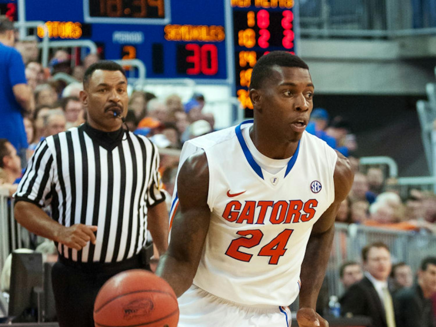 Casey Prather dribbles during Florida’s 67-66 win against Florida State on Nov. 29, 2013, in the O’Connell Center.