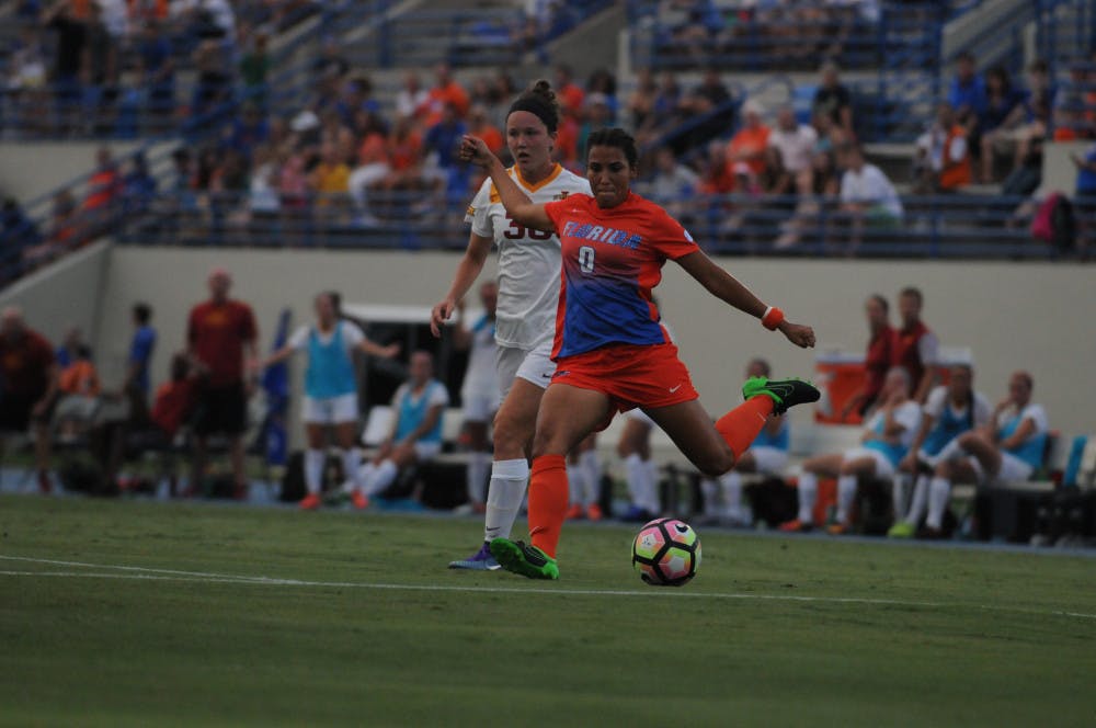<p>UF midfielder Briana Solis takes a shot during Florida's 5-2 win against Iowa State on Aug. 19, 2016, at James G. Pressly Stadium.</p>