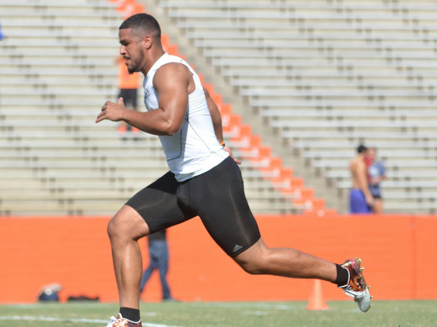 Former UF tight end Clay Burton runs the 40-yard dash during UF's Pro Day on Tuesday at Ben Hill Griffin Stadium.