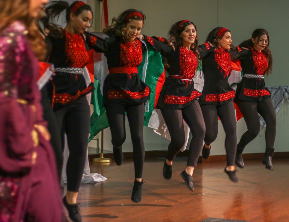 Bulls Dabke performs a traditional Levantine dance at Students for Justice in Palestine’s second annual Middle Eastern Fashion Show on Sunday. The group traveled from the University of South Florida to take part in the event. More than 100 people attended the fashion show, watched the dance performance and ate traditional Palestinian food.