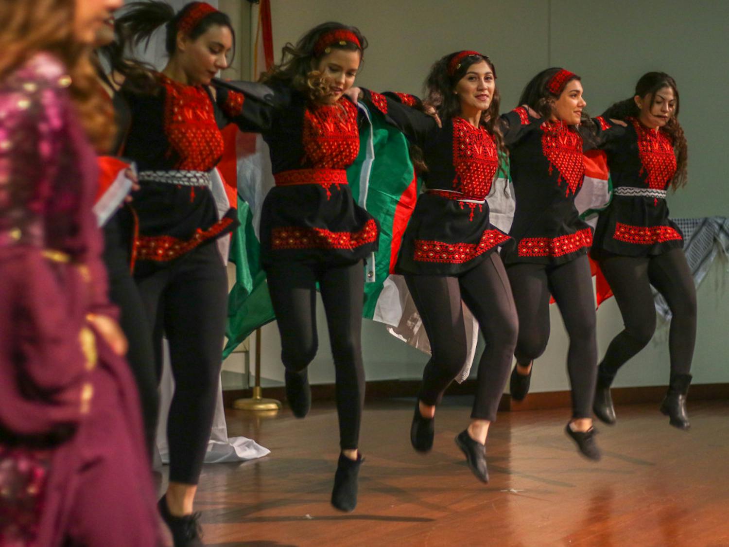 Bulls Dabke performs a traditional Levantine dance at Students for Justice in Palestine’s second annual Middle Eastern Fashion Show on Sunday. The group traveled from the University of South Florida to take part in the event. More than 100 people attended the fashion show, watched the dance performance and ate traditional Palestinian food.