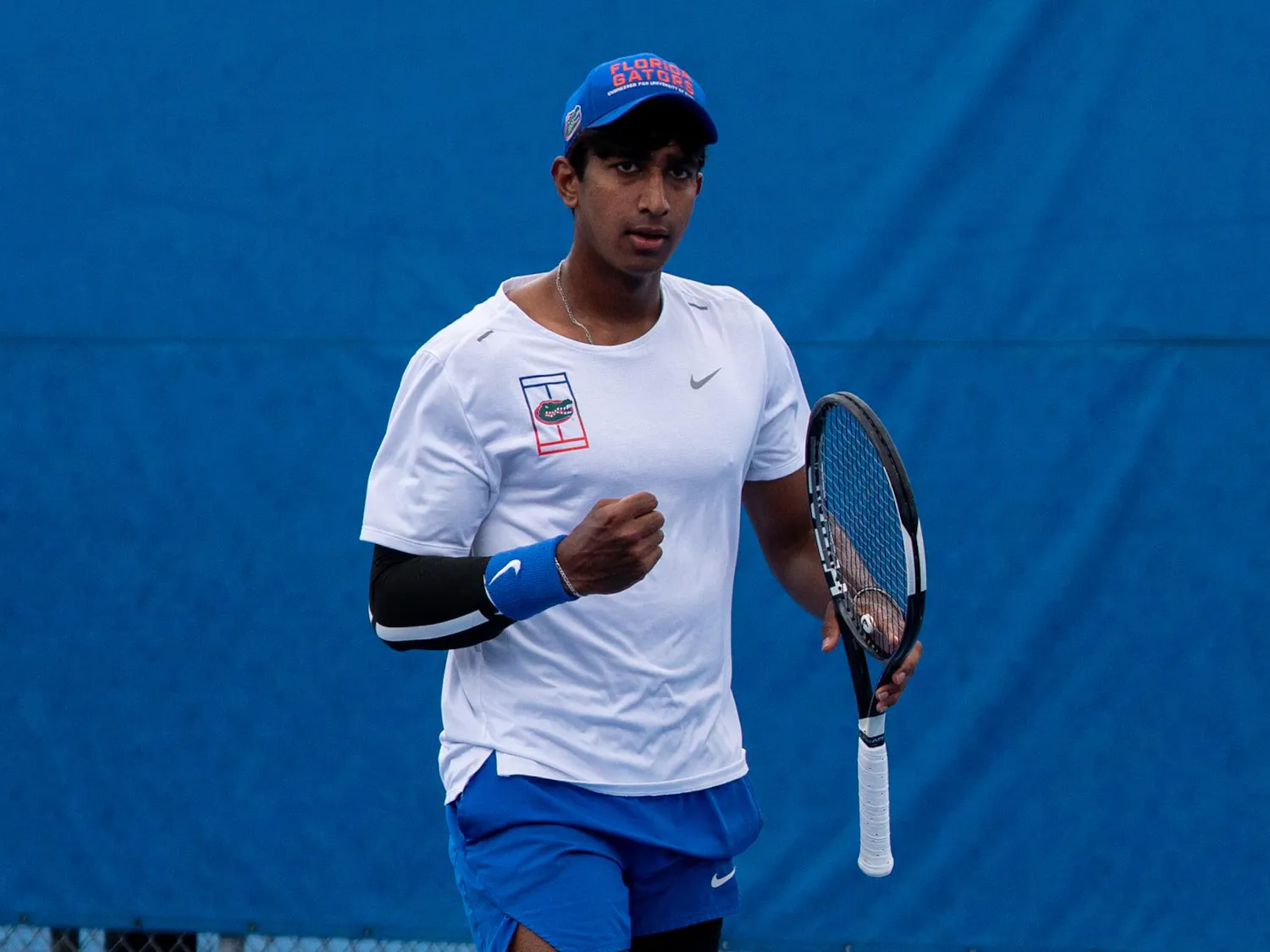 Florida’s Adhithya Ganesan celebrates in a NCAA men's singles tennis match against Oklahoma, Sunday, March 29, 2026, in Gainesville, Fla.