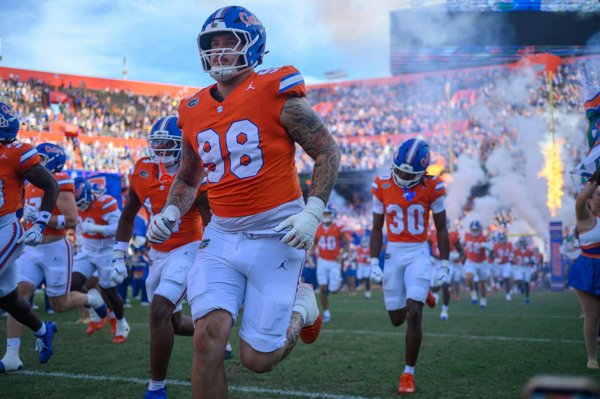 Florida defensive lineman Mason Clinton (98) runs out onto the field in the first half of an NCAA college football game against Campbell, Saturday, Sept. 12, 2026, in Gainesville, Fla.