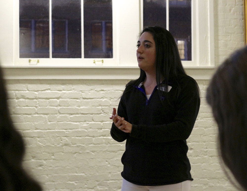 <p>UF Women's Student Association president Daniella Gennaro speaks to a room of about 20 people in Ustler Hall during an event titled "Period Shaming: A Real Conversation About Menstruation.” The 21-year-old finance and women's studies senior believes that combating period shaming starts with parents teaching their children the naturalness of a period.</p>