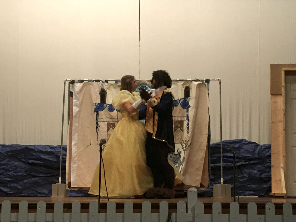 Rachel Butts (left) plays the part of Belle in “Beauty and the Beast” alongside John Mayfield who plays Beast. Both first-year UF medical students, the pair performs with The White Coat Company, a student-run organization through the College of Medicine, on the pediatric floor at UF Health Shands Hospital.