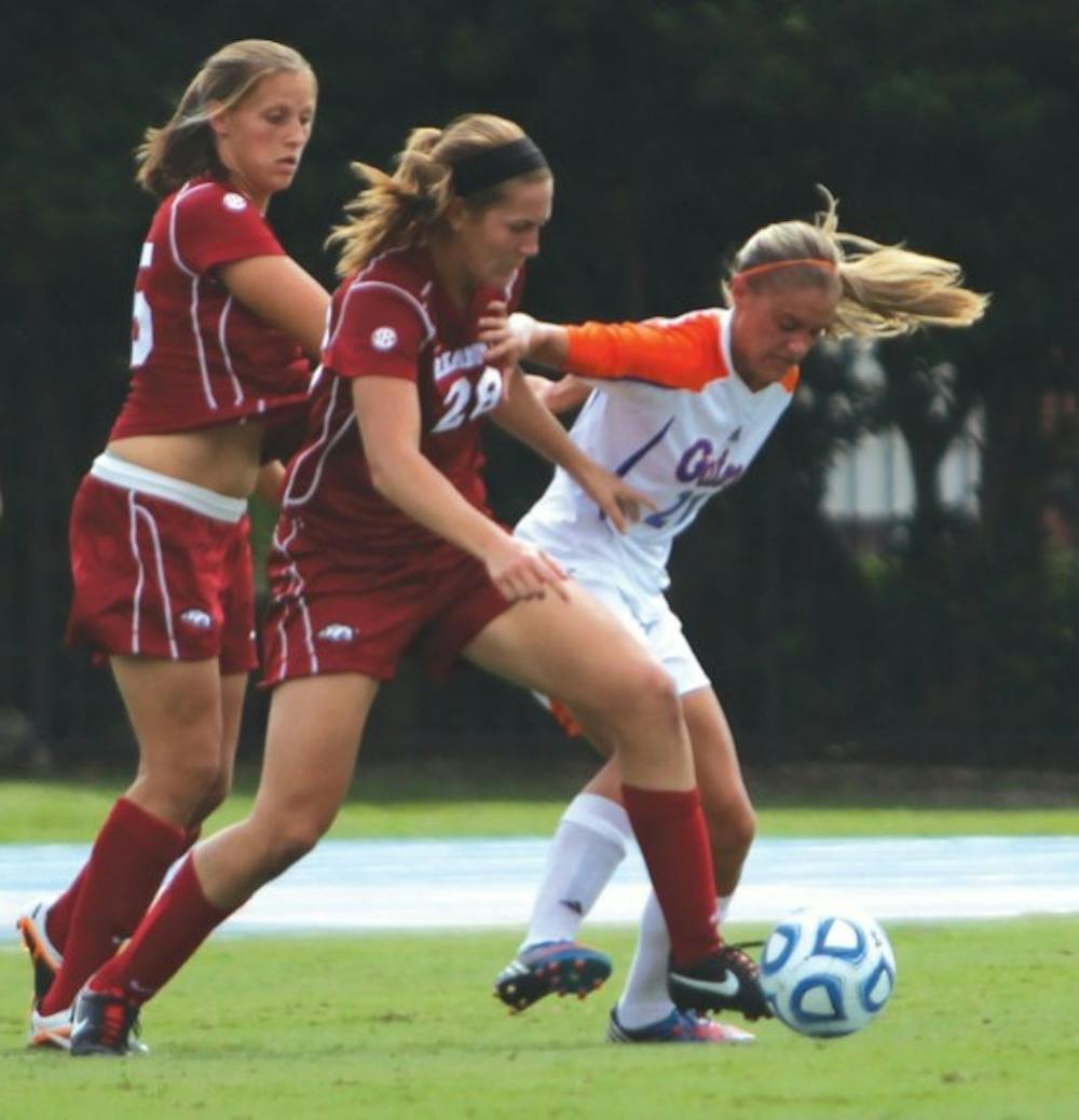 <p>Sophomore forward Jillian Graff fights for the ball against Arkansas in UF’s 4-0 win on Sunday afternoon at James G. Pressly Stadium. She ranks second on UF with three goals despite starting just two games.</p>