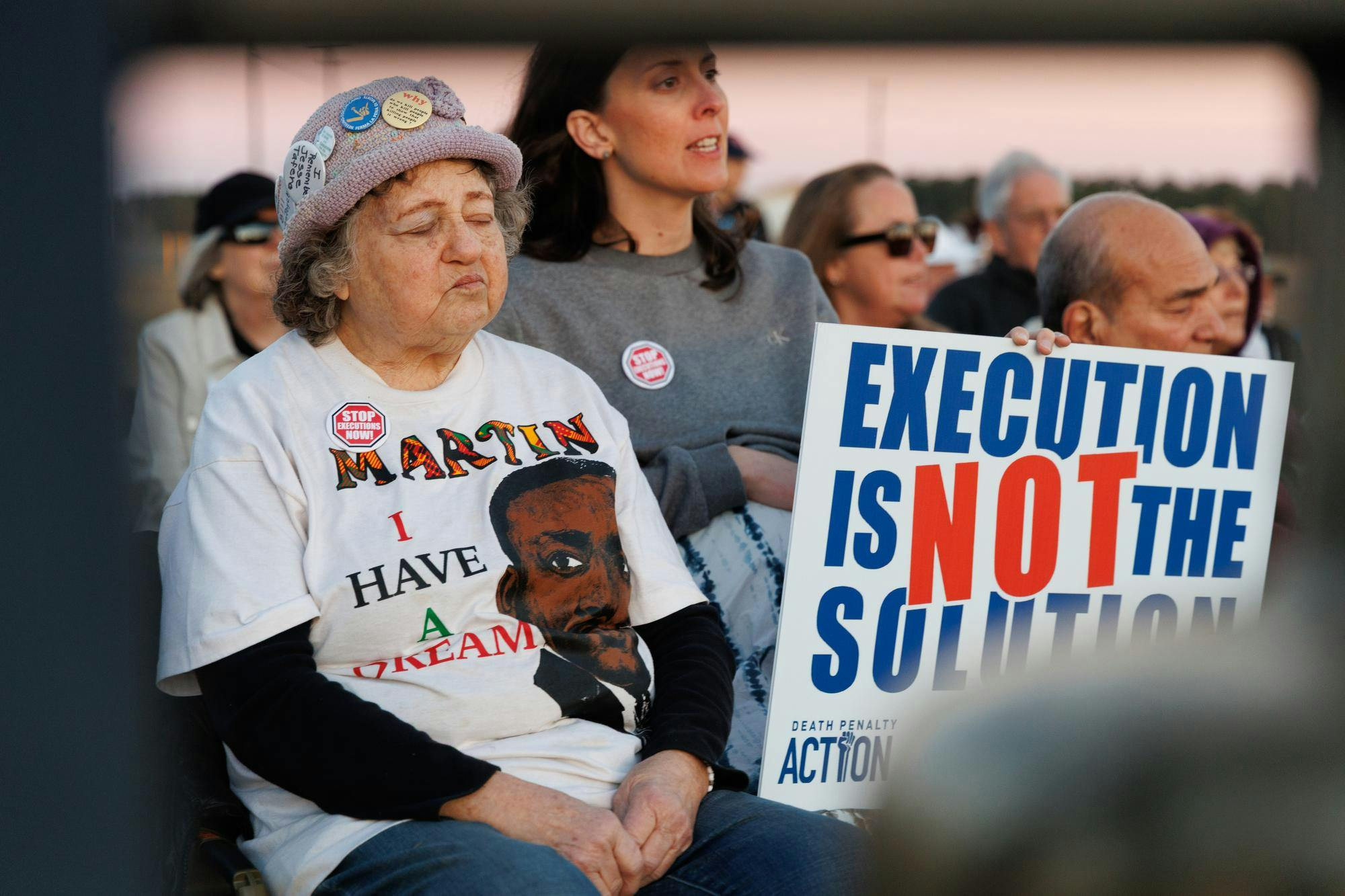 Helen Pajama, a protestor of the death pentalty, sits outside Florida State Prison in opposition to the execution of Ronald Palmer Heath. Heath was executed in Raiford on Tuesday, Feb. 10, 2026.