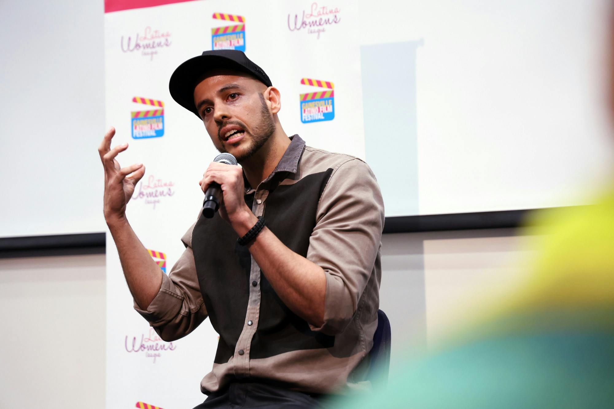 David David, director of “La Frontera,” answers audience questions during the 21st Gainesville Latino Film Festival, presented by the Latina Women’s League, at the Harn Museum of Art on Thursday, Sept. 11, 2025.