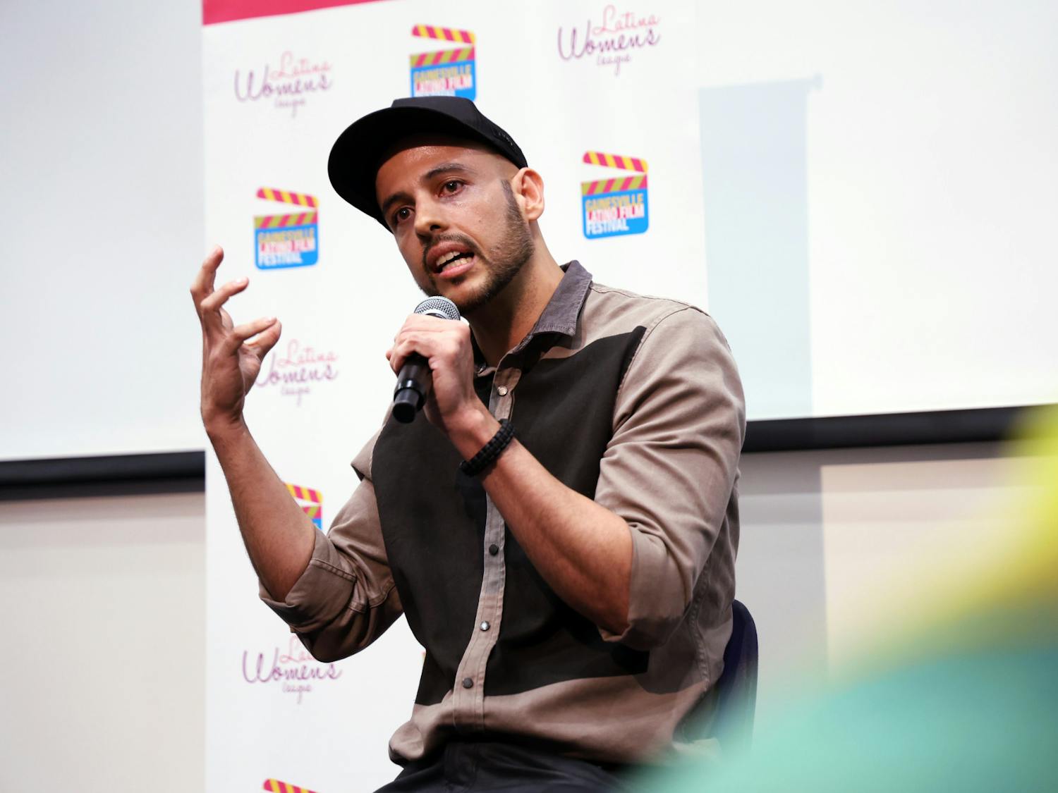 David David, director of “La Frontera,” answers audience questions during the 21st Gainesville Latino Film Festival, presented by the Latina Women’s League, at the Harn Museum of Art on Thursday, Sept. 11, 2025.