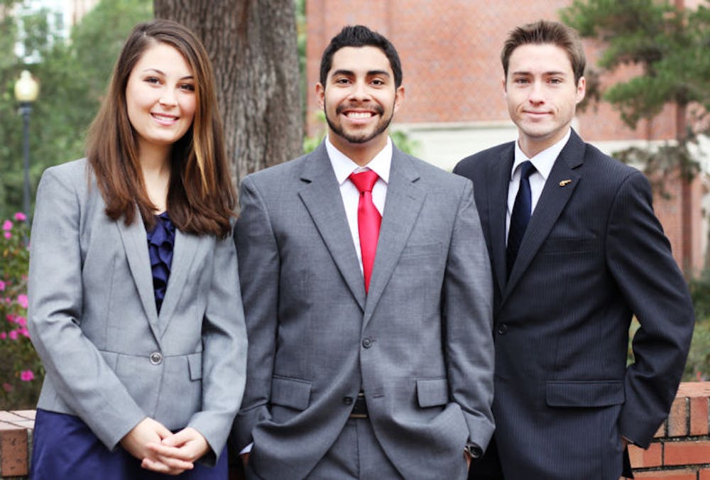 <p>Jenna Goldman, the Students Party’s vice presidential candidate, stands next to presidential candidate Johnny Castillo and Billy Farrell, the party’s candidate for treasurer.</p>