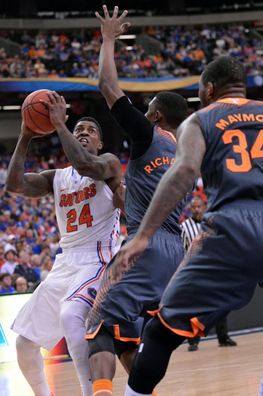<p>Casey Prather prepares to shoot during Florida’s 56-49 win against Tennessee in the 2014 SEC Tournament in the Georgia Dome.</p>