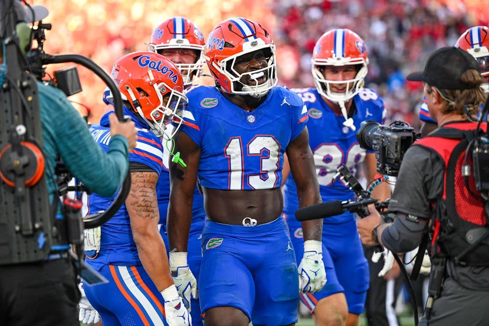Florida running back Jadan Baugh (13) celebrates a touchdown during a NCAA college football game, Saturday, Nov. 1, 2025, in Jacksonville, Fla.