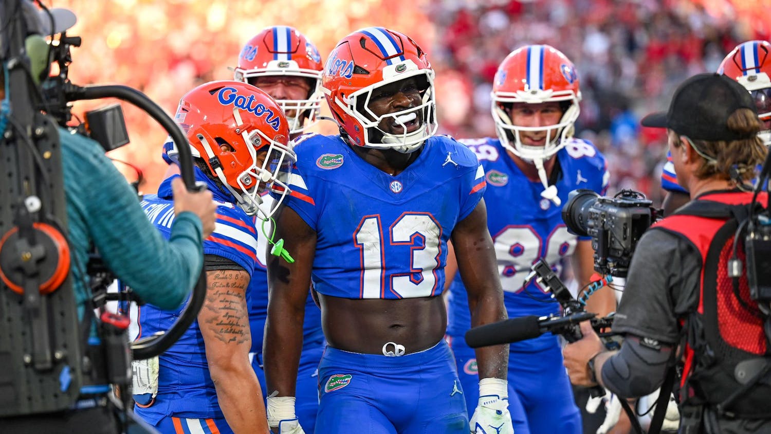 Florida running back Jadan Baugh (13) celebrates a touchdown during a NCAA college football game, Saturday, Nov. 1, 2025, in Jacksonville, Fla.
