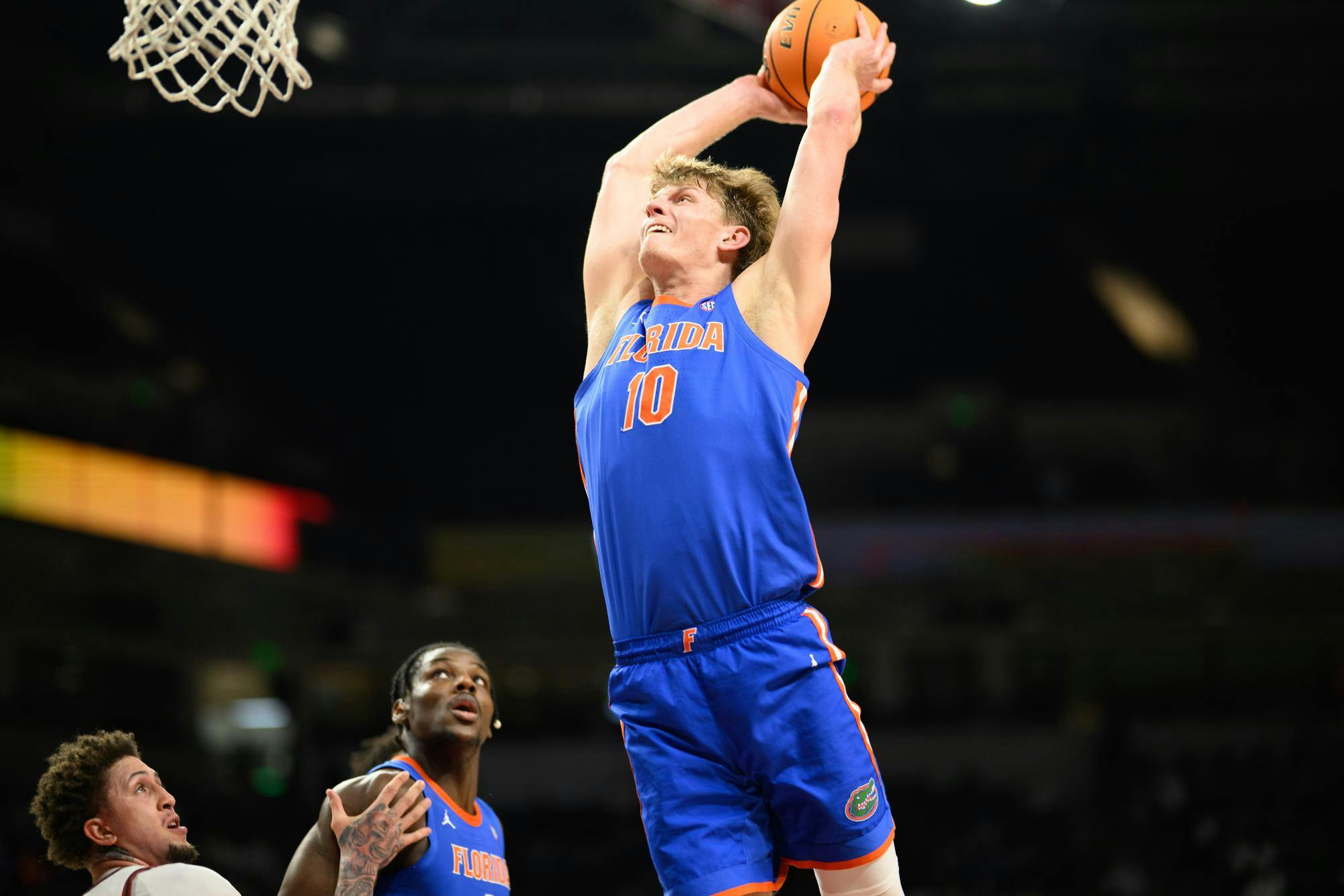 Florida forward Thomas Haugh (10) dunks during the first half of an NCAA college basketball game against South Carolina, Wednesday, Jan. 28, 2026, in Columbia, S.C.