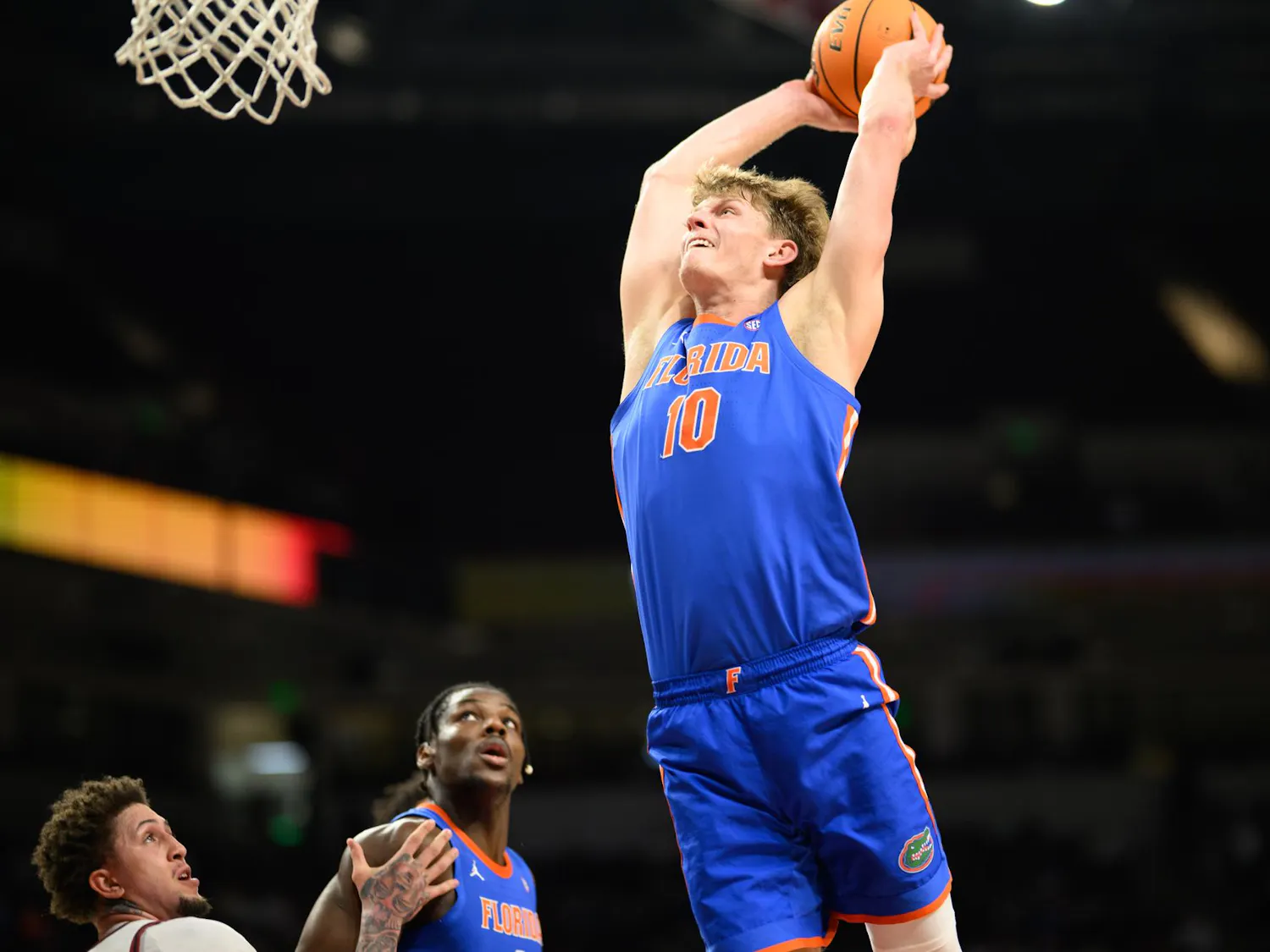 Florida forward Thomas Haugh (10) dunks during the first half of an NCAA college basketball game against South Carolina, Wednesday, Jan. 28, 2026, in Columbia, S.C.