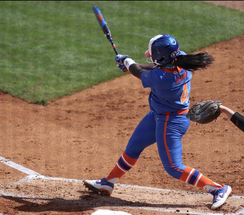 Third baseman Charla Echols swings through a pitch against Louisville on Feb. 27