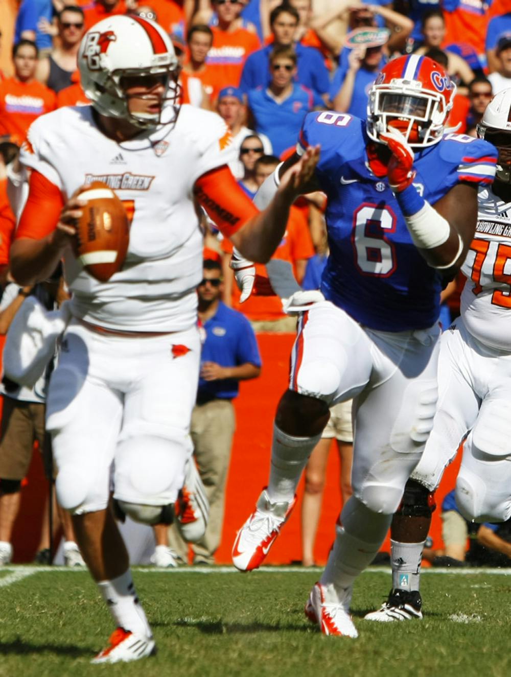 <p>Defensive lineman freshman Dante Fowler Jr. (6) runs down Bowling Green University quarterback Matt Schilz (7) during the season opener win on Saturday at Ben Hill Griffin Stadium.</p>