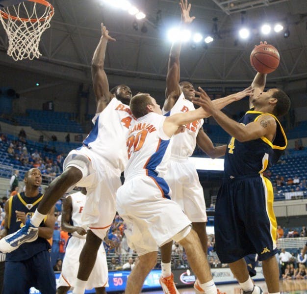 Florida coach Billy Donovan said sophomore forward Will Yeguete (15) will be key on the boards this season for the Gators, who lost 50.7 percent of their rebounding output from a year ago with the departure of seniors Vernon Macklin, Alex Tyus and Chandler Parsons.