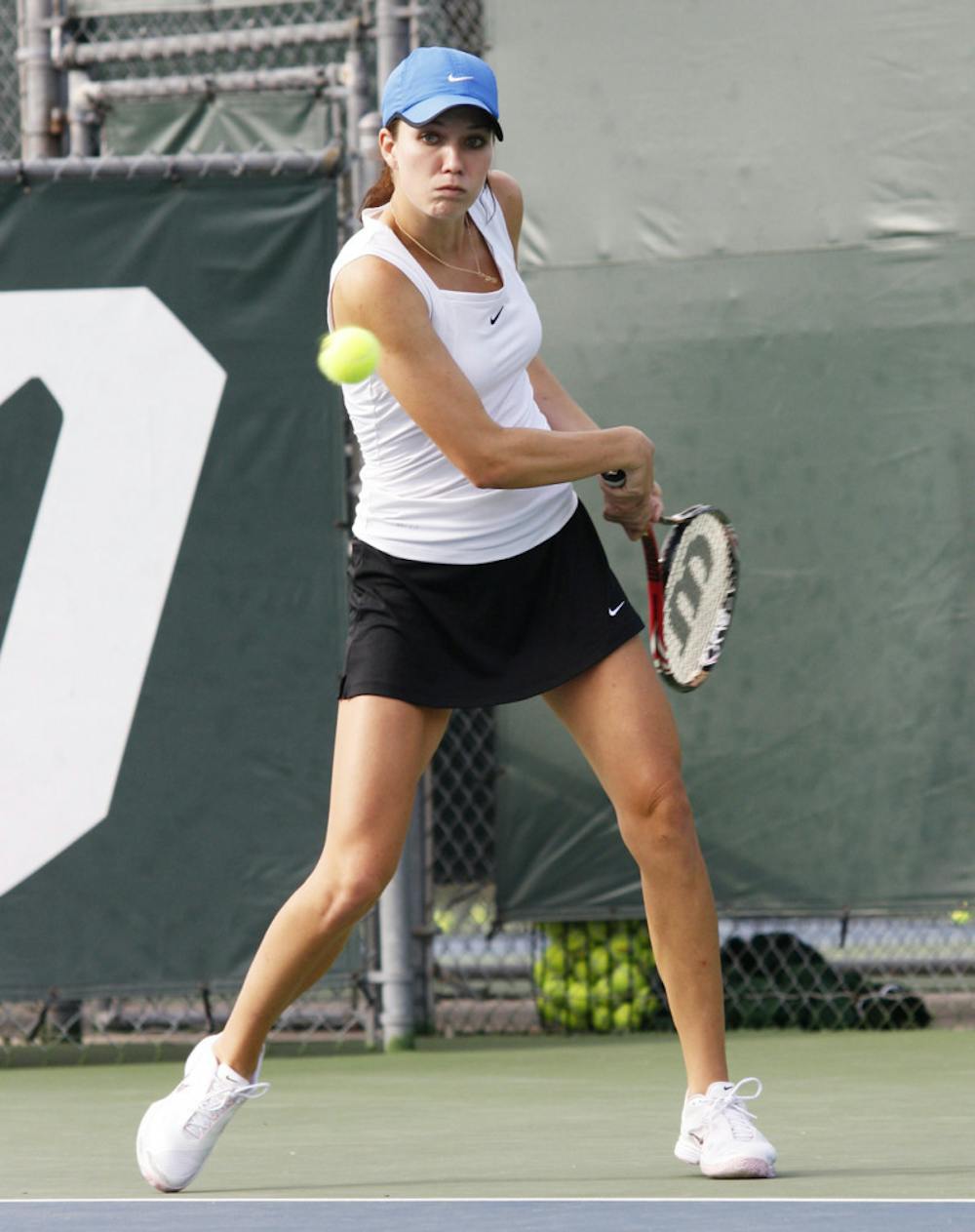 <p align="justify">Freshman Danielle Collins returns a serve during UF’s 7-0 win against USF on Jan. 29 at Linder Stadium. Collins teamed with Olivia Janowicz to win the only doubles match for the Gators on Friday.</p>