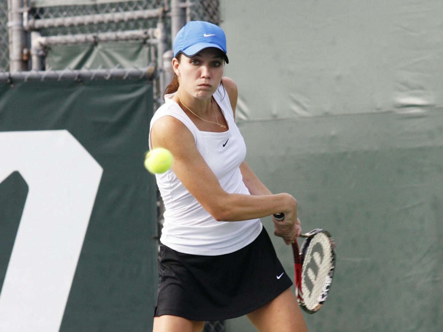 Freshman Danielle Collins returns a serve during UF’s 7-0 win against USF on Jan. 29 at Linder Stadium. Collins teamed with Olivia Janowicz to win the only doubles match for the Gators on Friday.