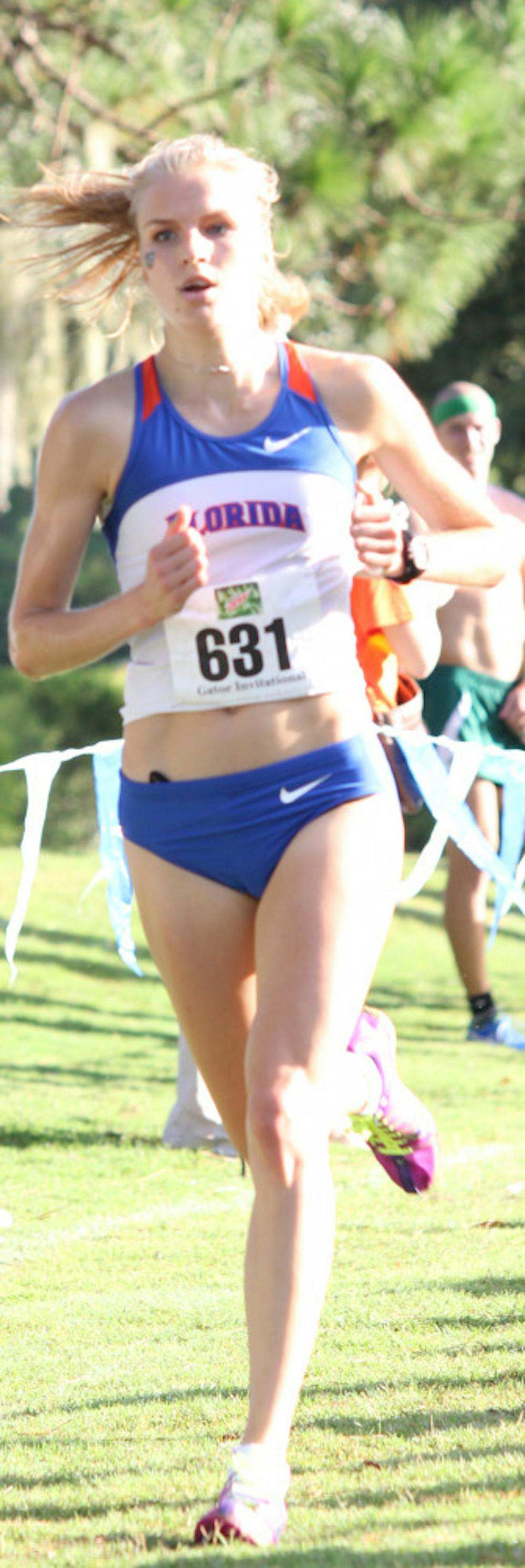 <p>Junior runner Agata Strausa, runs in the Mountain Dew Invitational on Sept. 15 at the Mark Bostick golf course. </p>