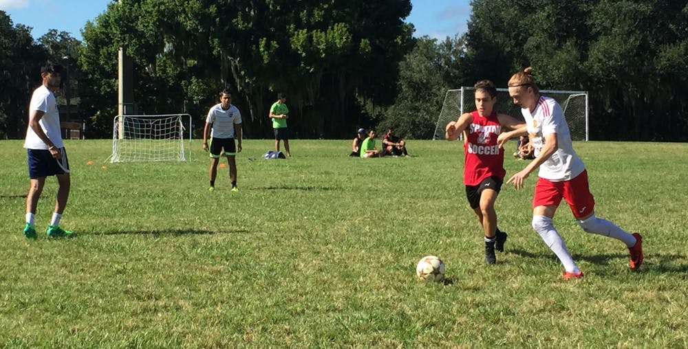 Participants face off in a soccer tournament celebrating Hispanic Heritage Month. The field day activities followed a 5K race that raised money for UF Chispas.