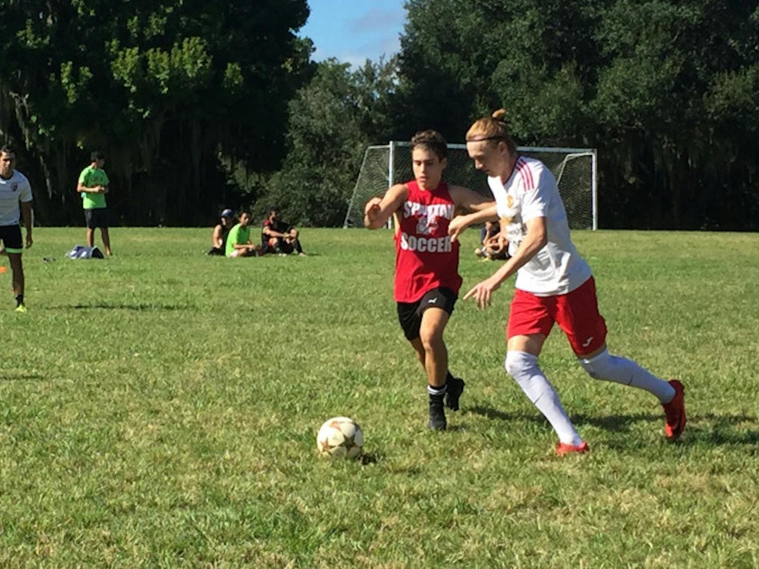Participants face off in a soccer tournament celebrating Hispanic Heritage Month. The field day activities followed a 5K race that raised money for UF Chispas.